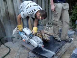 Barbeque top istallation - cuting granite stone block