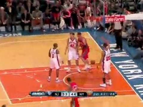 NBA Devin Harris tosses a nice alley-oop to the big man down