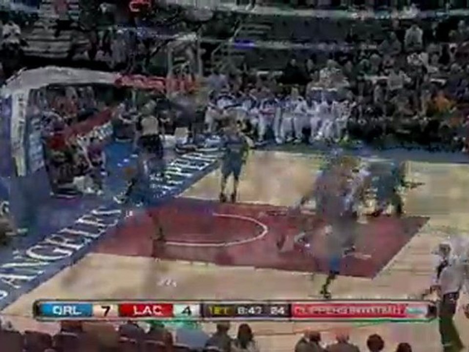 NBA Baron Davis recovers the dribble and dishes to Chris Kam