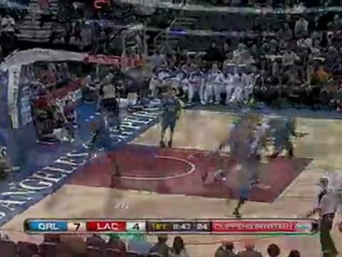 NBA Baron Davis recovers the dribble and dishes to Chris Kam