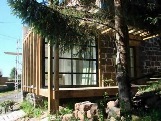 Ossature bois: Extension contemporaine  maison de pierre