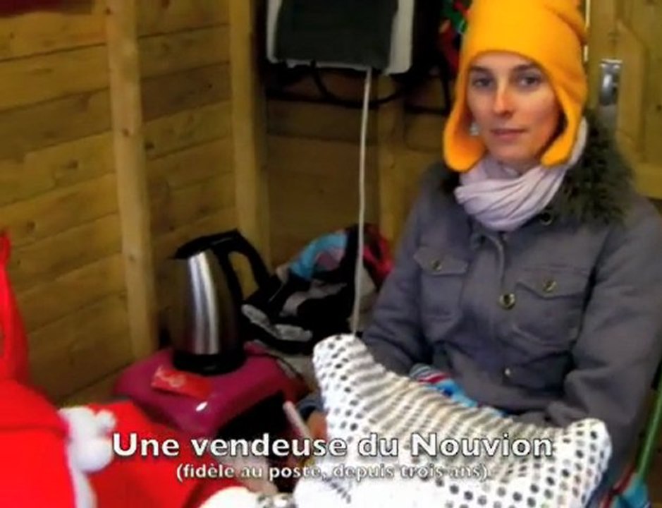 Un marché de Noël sous la neige