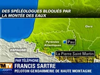 Trois spéléologues bloqués