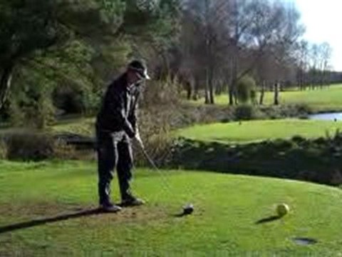 Bertrand Drives the 8th hole over the lake