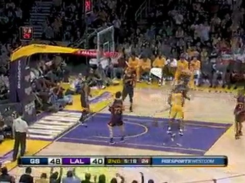 NBA Pau Gasol spins around his opponent and finishes with a