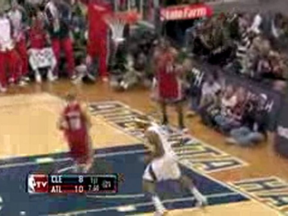 NBA Mike Bibby gets the rebound and Josh Smith finishes with