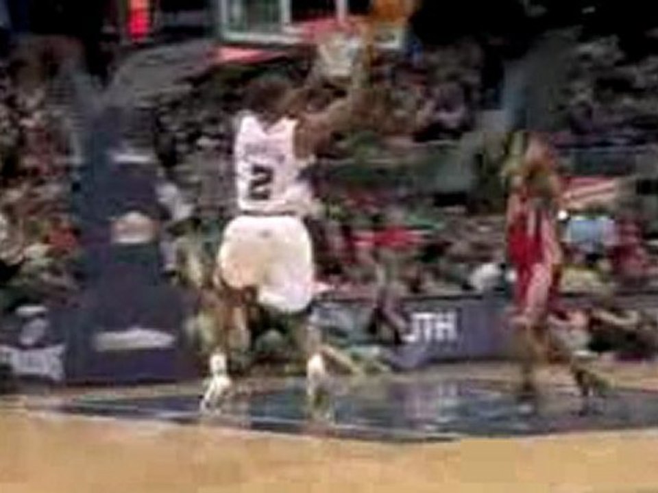 NBA Joe Johnson connects with Josh Smith on the alley-oop an