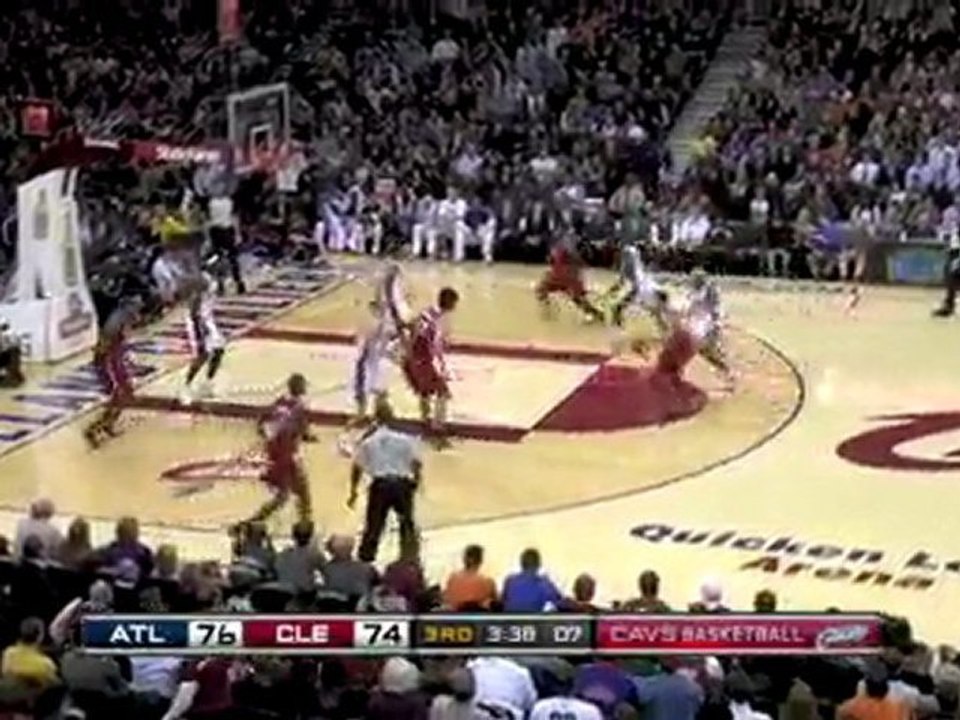 NBA Mike Bibby connects with Josh Smith for the nice dunk.