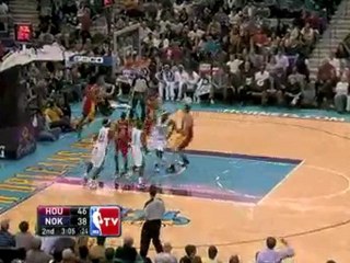 NBA James Posey steals the ball from a Rockets player; Julia