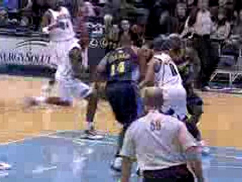 NBA Carlos Boozer blocks a shot away from danger during the