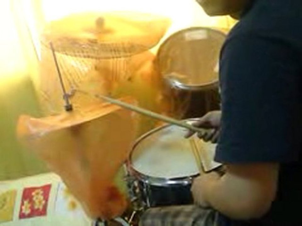 Chris Veloso playing drums