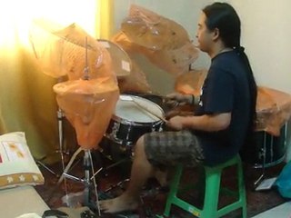 Chris Veloso playing drums 4