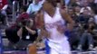 NBA Baron Davis slides a nice pass down the paint to Rasual