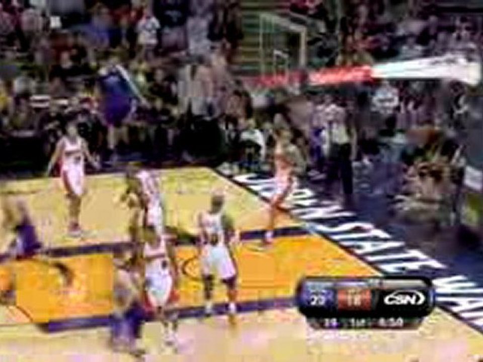 NBA Jason Thompson receives the pass and hammers it home.