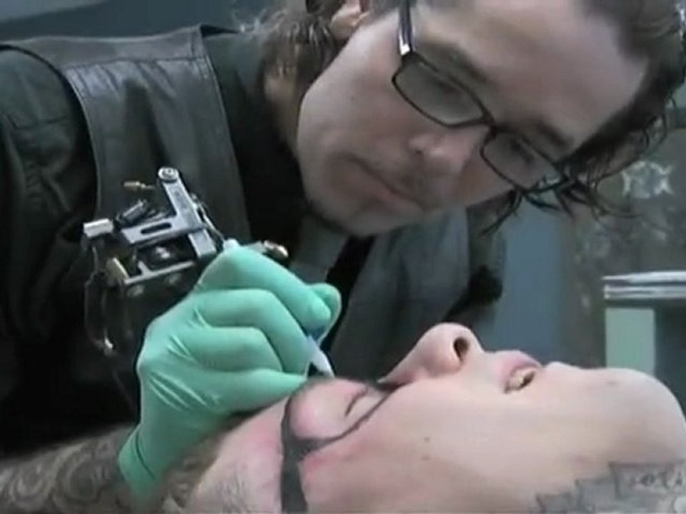 Guy with Rayban Tatoo