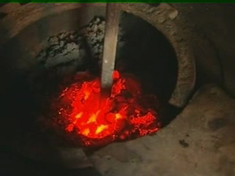 Ed Miliband: 'we won't relax on emission cuts'