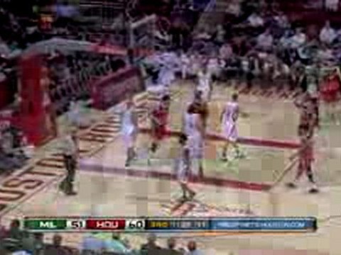 Andrew Bogut goes baseline and gets the dunk and the foul.