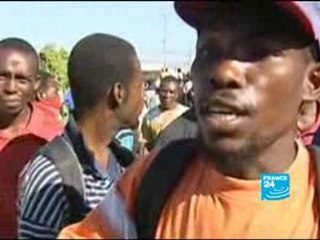 Pillages et désespoir à Port-au-Prince, arrivée de GIs