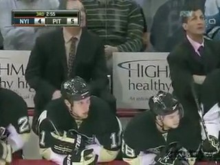 Andy Sutton Charge à la Bande Pascal Dupuis NHL Sang