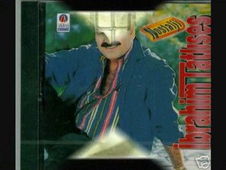 İbrahim TATLISES - Mavi Yelek Mor Düğme