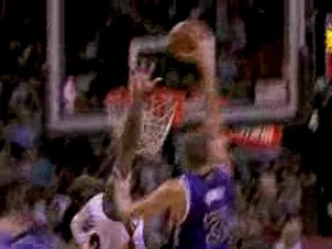 Dwyane Wade rejects Spencer Hawes.