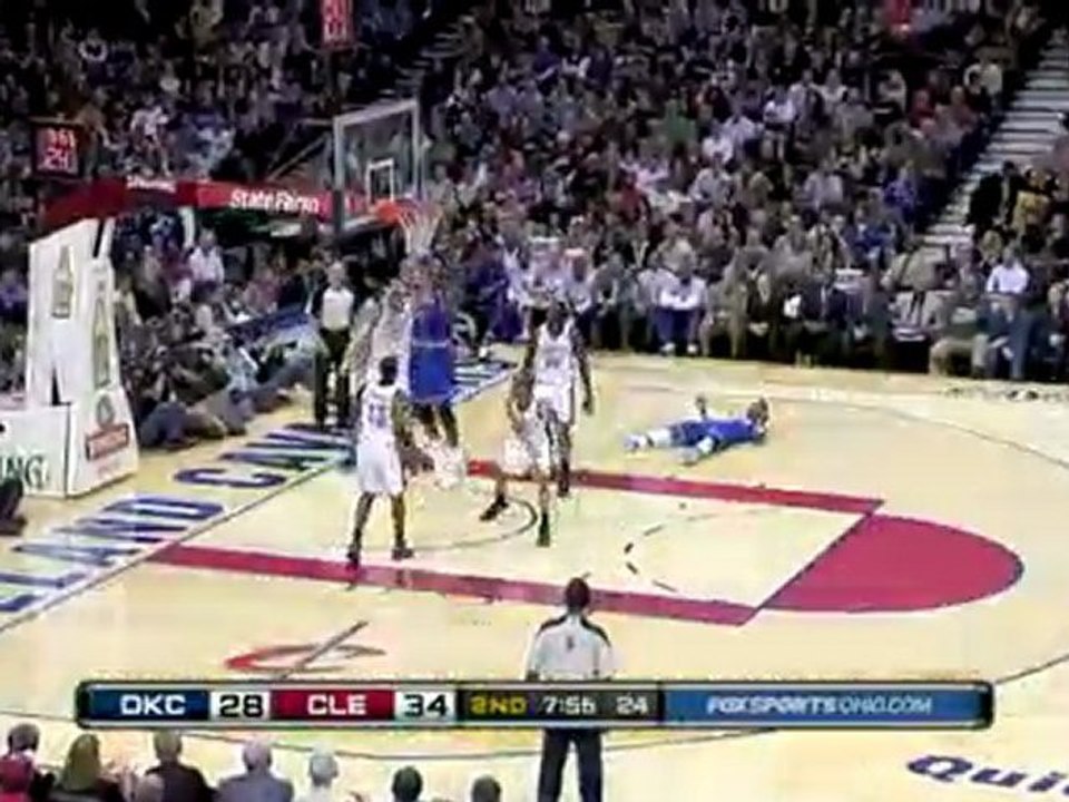 Shaquille O'Neal grabs the rebound and hammers it home with