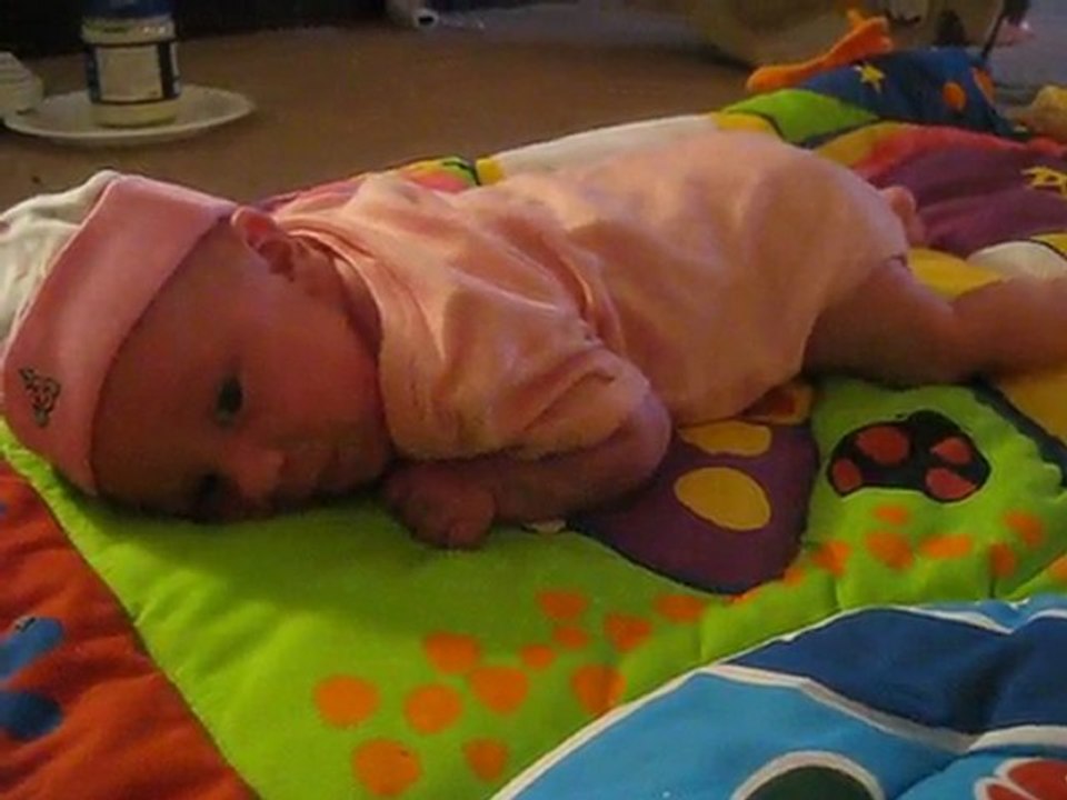 aspen mikal trying to crawl at 5 1/2 weeks old.