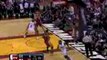 Dwyane Wade picks up the errant pass and throws down a dunk