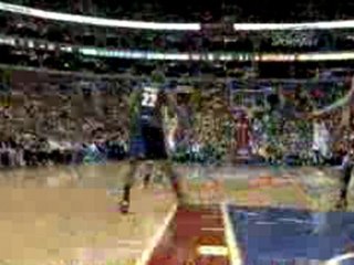Andre Iguodala gets the hoop and the harm in the thrd quart