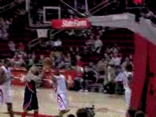 Jermaine Taylor is fouled on the way to the hole, gets twist