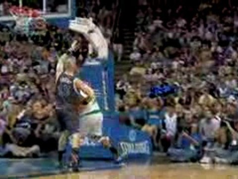 Dwight Howard pins the shot attempt against the backboard.