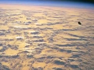 NASA STS-88 black transforming UFO