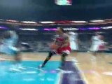 Derrick Rose drives the lane and finishes with a two- handed