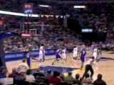 Kobe Bryant sinks the 3-pointer at the end of the first quar