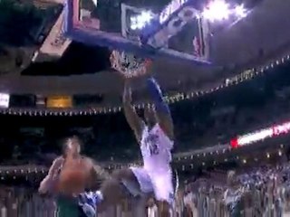Dwight Howard flies through the air to get this Jason Willia