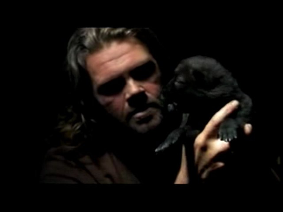 Shaun Ellis teaching a wolf cub to howl