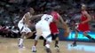 Derrick Rose spins past a defender and finishes with authori