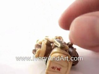 Mammoth Ivory Netsuke - Buddha Carrying kid in a Jute Bag