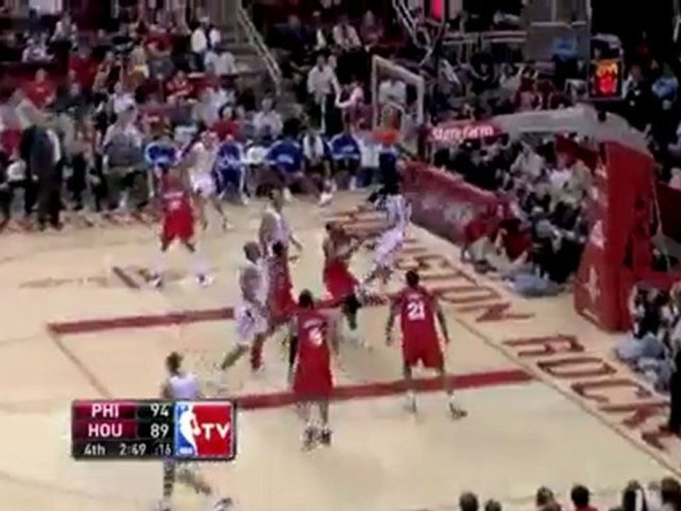 Aaron Brooks drives and spins right by Thaddeus Young on his