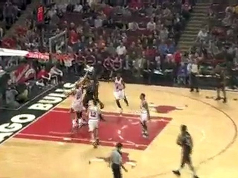 Brad Miller blocks Jermaine O'Neal 's shot during the first