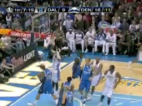 Nenê spins and gets the hook shot in the lane to fall.