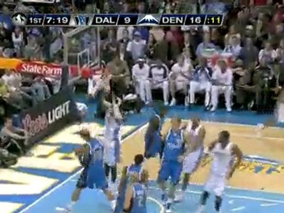 Nenê spins and gets the hook shot in the lane to fall.