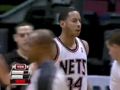 Devin Harris drives the paint, stops and pops for two plus t