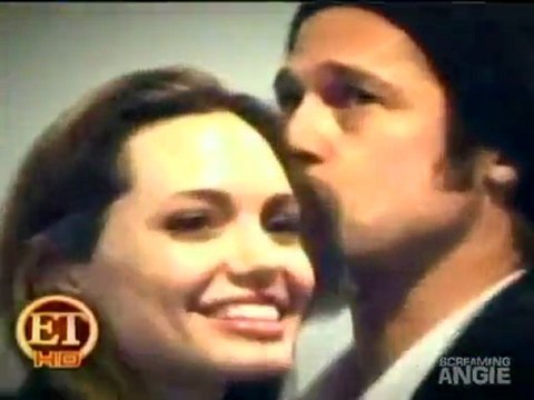 ANGELINA JOLIE & BRAD PITT , MADDOX SUPER BOWL XLIV