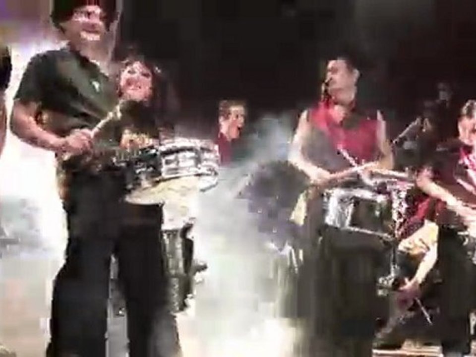 Drummers drumming a wicked beat