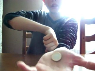 disparition d'une piece dans la main