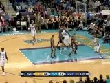 Emeka Okafor skies towards the rim and throws down the miss.