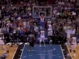Vince Carter drives and throws down the big dunk as time win
