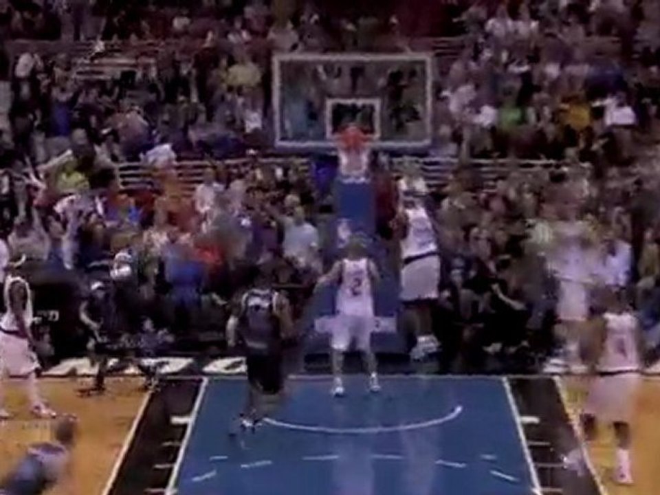 Vince Carter drives and throws down the big dunk as time win