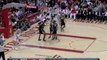 Luis Scola throws the rock off the glass and Trevor Ariza sl